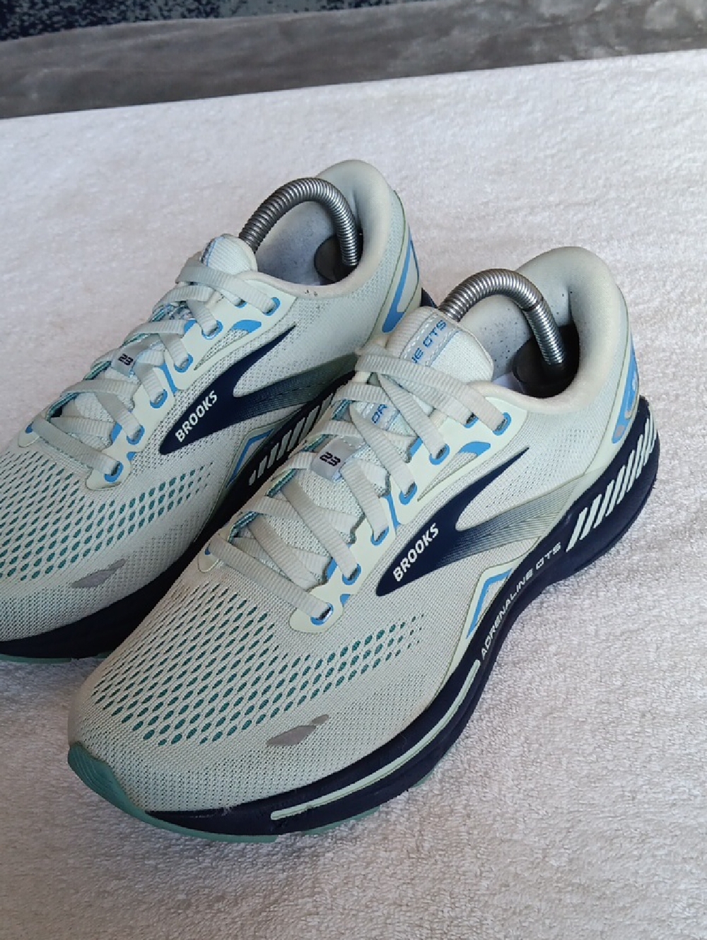 Brooks Women's Running Shoes in Light Teal and Navy Blue